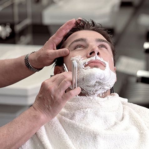 Hot towel head shave includes beard & head portfolio