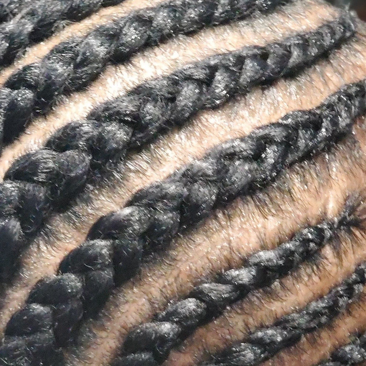 Woman hair braided down /with wash and treatment portfolio
